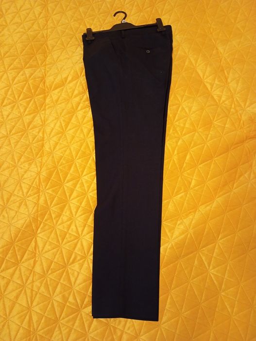 Spodnie garniturowe granatowe H&M
1 raz użyte.