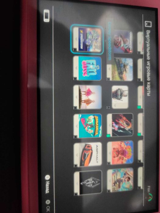 Nintendo Switch Lite та купа ігор плюс геймпад