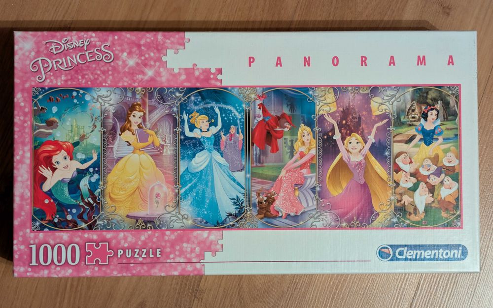 Puzzle panoramiczne 1000 Clementoni KSIĘŻNICZKI Disney