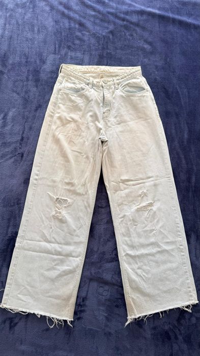 Calça jeans de lavagem clara