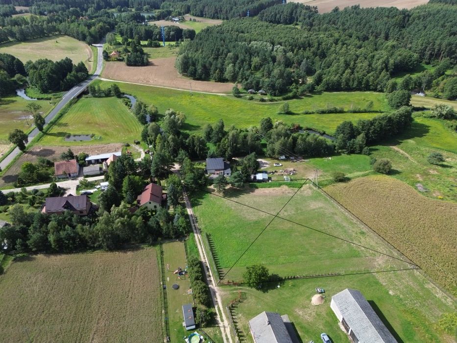 Działka 4000 m² z WZ | Rzeka Wel 100 m | Jezioro 400 m | Ogrodzona