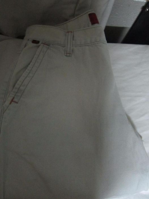 Calças de Ganga Claras Tom Maso Unisexo Tamanho 36 de fecho e com boca
