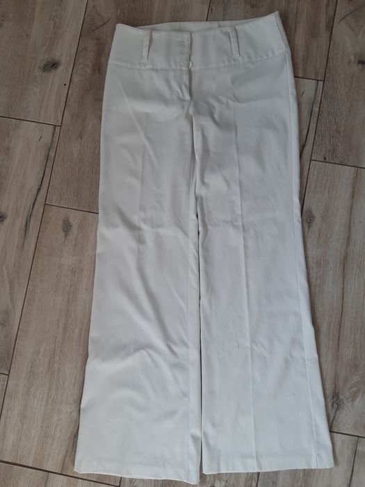 Spodnie kremowe eleganckie