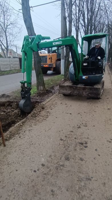 Мини екскаватор гусиничный  аренда доставка в любую точку города течен