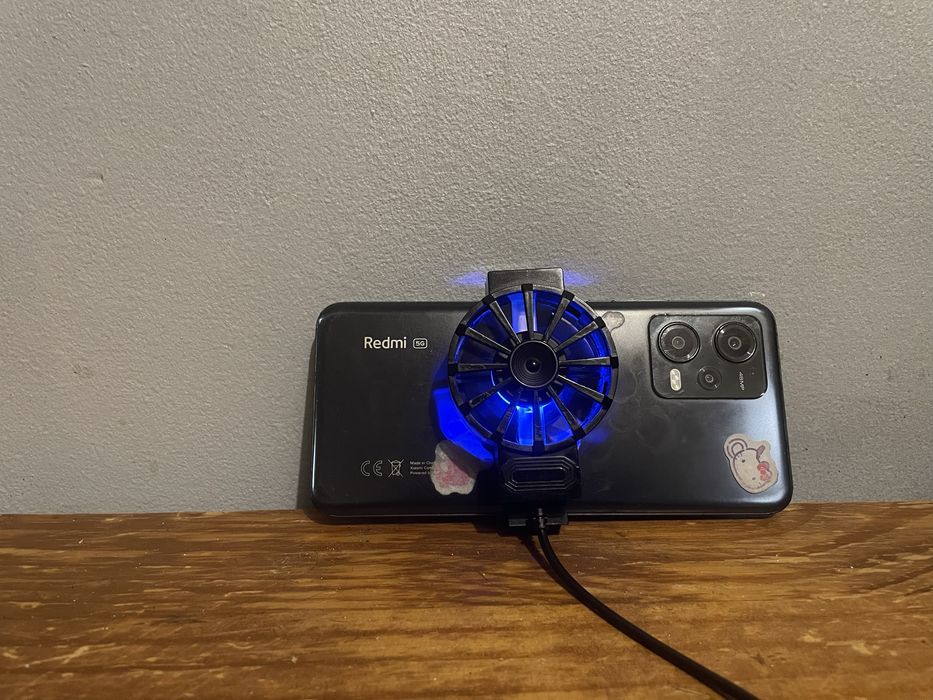 Ventilador de tomada adaptavel para resfriar telemovel.