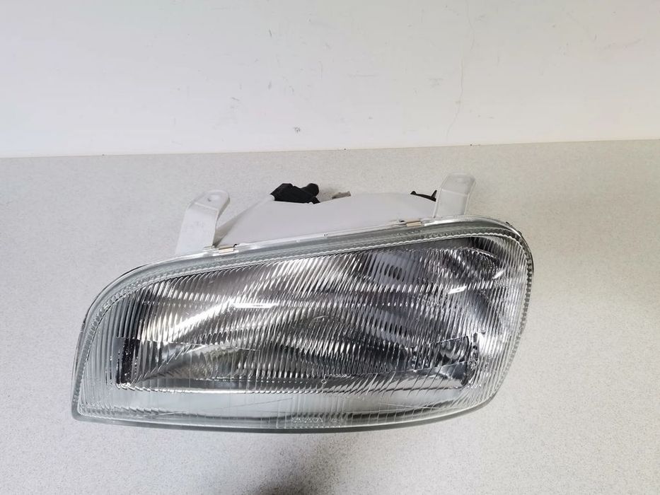 lampa reflektor lewy  toyota rav4 rav 4 i 94-97 oryginał