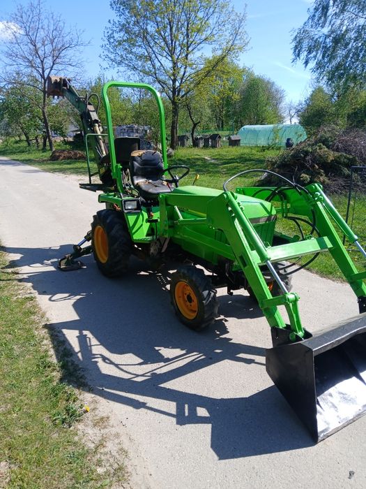 Ciągnik koparko ładowarka john deere 855