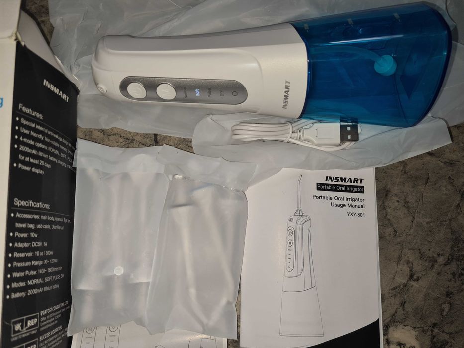 IRYGAToR ma 4 tryby mycia zębów 300ml + 6 różnych dysz końcówek