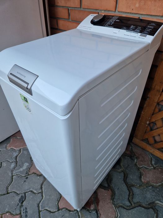 Вертикальна пральна машина з паром AEG L7TL710EX