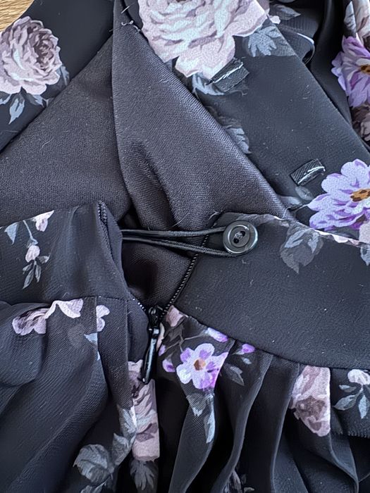 Czarna plisowana spódnica w kwiaty midi elegancka wiosna