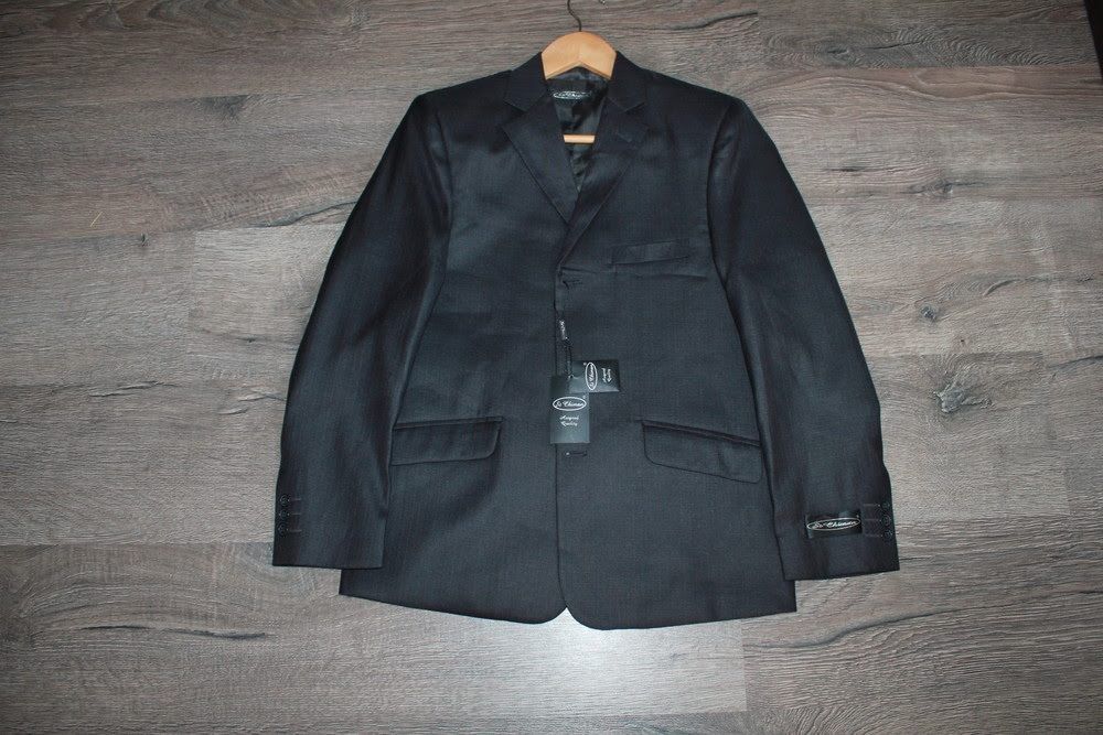 Новый Костюм на мальчика 12 лет.