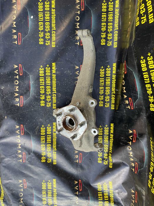 Кулак поворотний передній лівий Tesla M3 цапфа Tesla 3 1044311-00-E