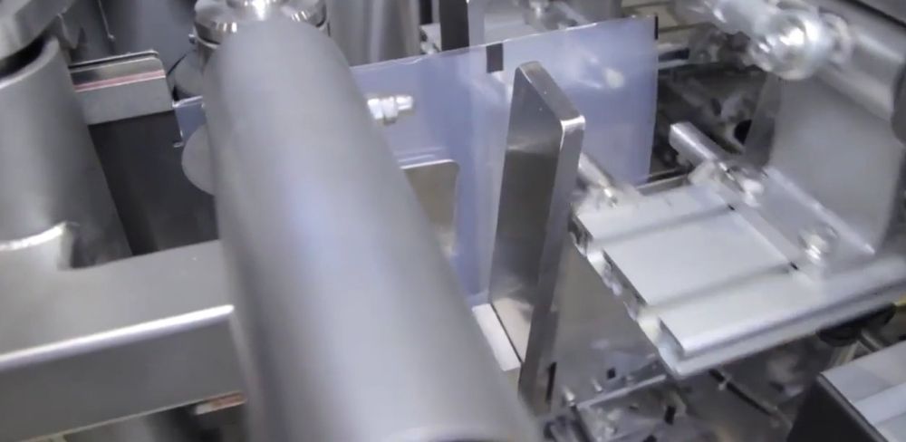 Автоматическая линия для фасовки в пакеты дой пак.Фасовка дой пак.