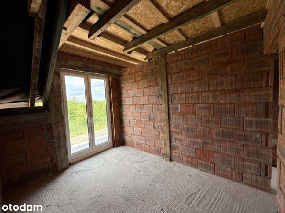 Nowoczesny dom w zabudowie bliźniaczej – 167 m² z garażem i poddaszem.