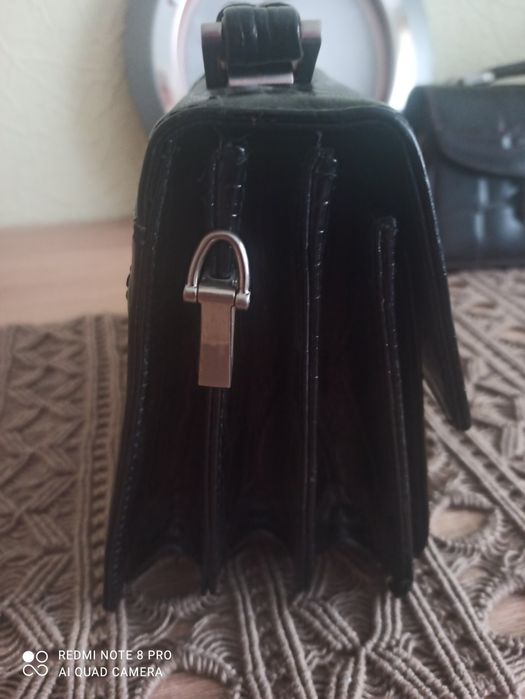 Чоловічі  барсетки  з натуральної шкіри