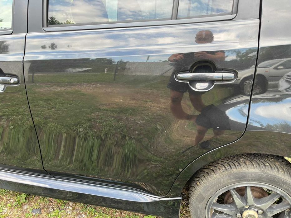 drzwi tył tylne tylnie lewe daihatsu materia x07 czarne 2006 - 2011