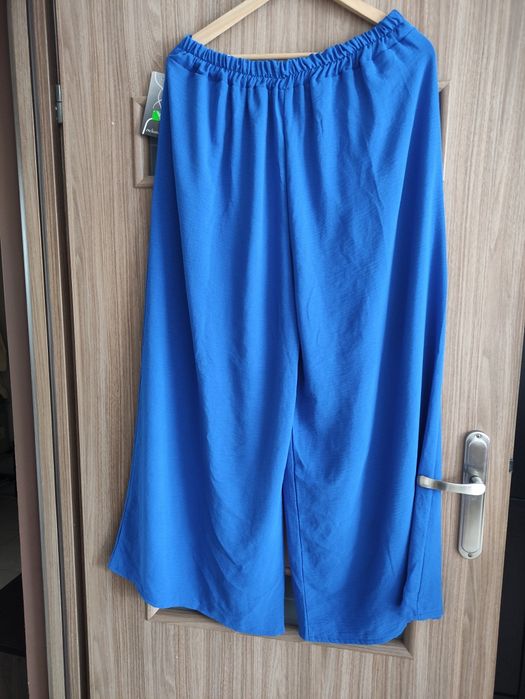 Nowe spodnie palazzo szerokie nogawki