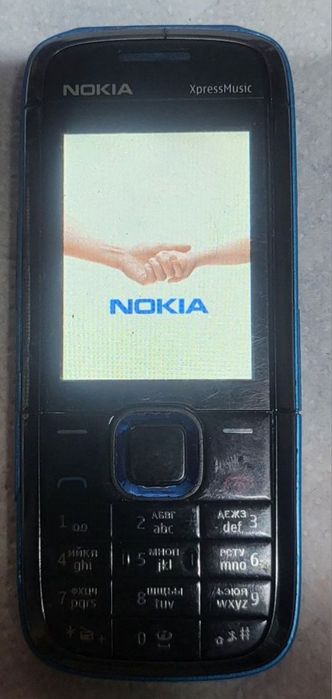 Мобильный,nokia 5130 xpressmusic. ,заряд,статуэ,sharp
