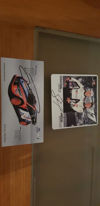 Autographs by Loeb, Ogier, Tanak, and Petter Solberg
