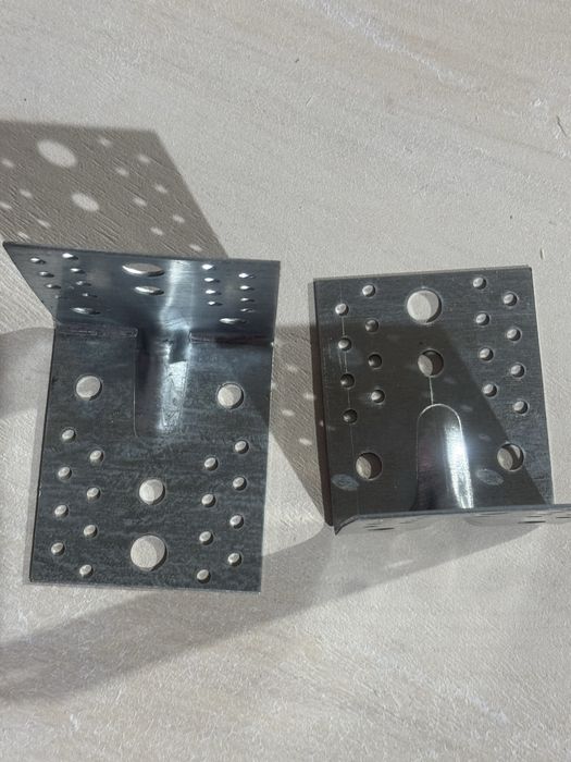 Перфероване кріплення,кутики,пластинни,підвішувачі балки.