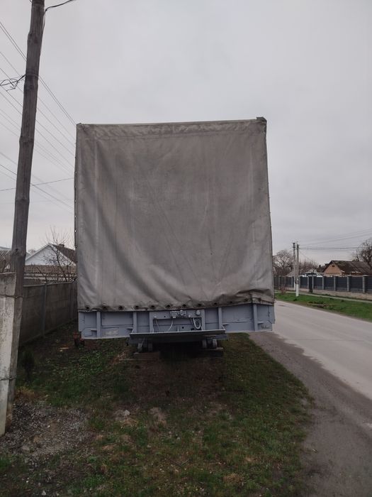 Напівпричіп бортовий тентований