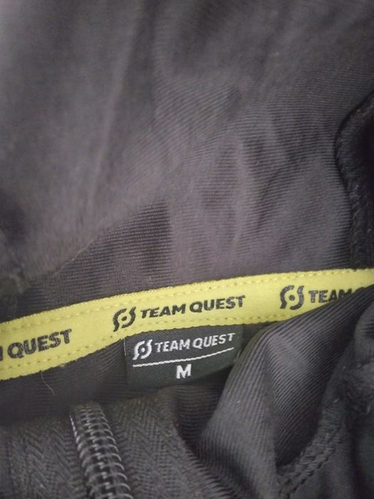 Fato de treino da team quest como novo