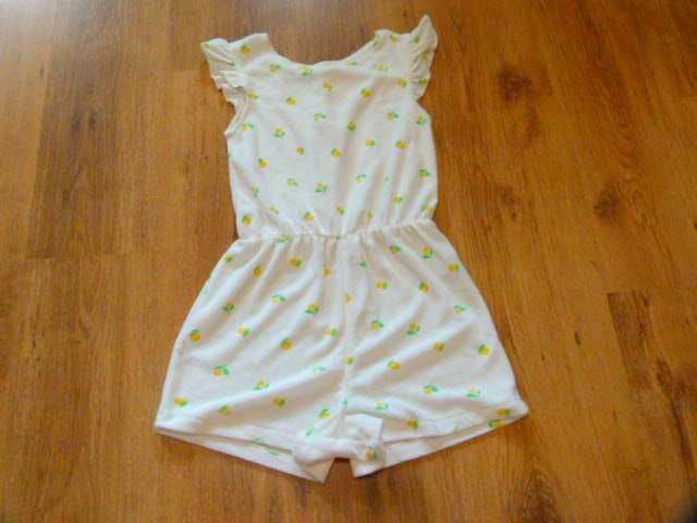 rozm 128 Primark kombinezon frotte biały w kwiaty żółte