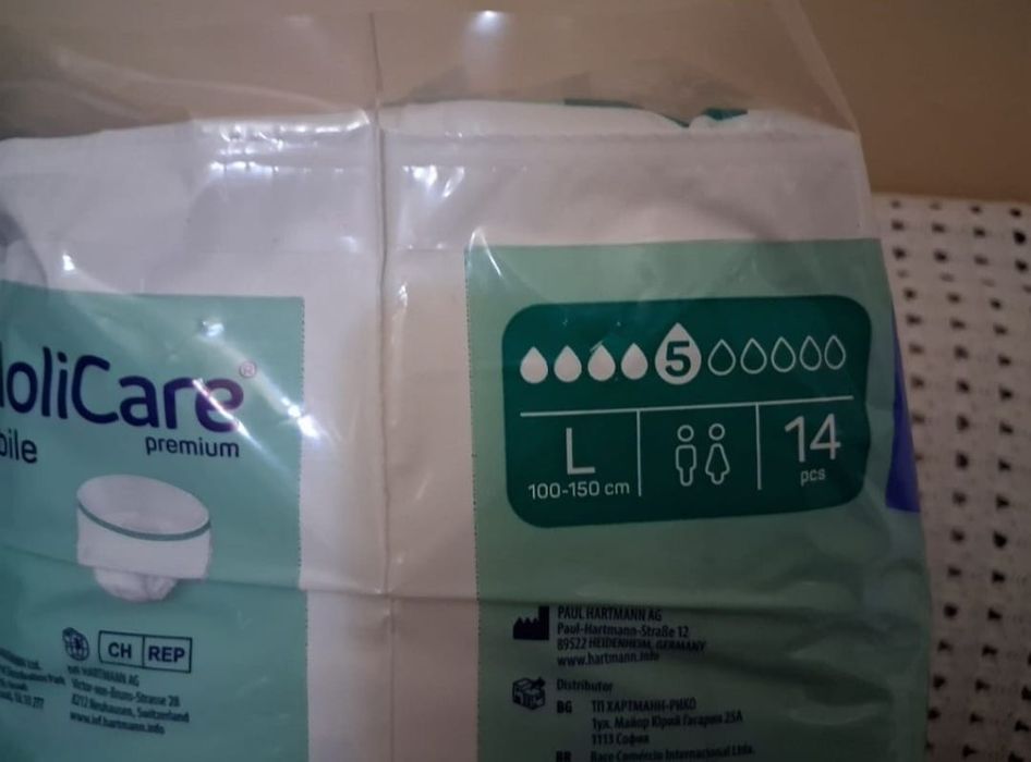 Vendo 3 embalagens de fraldas molicare