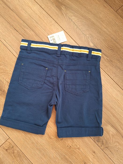 Eleganckie krótkie spodenki granatowe okaidi rozm 104