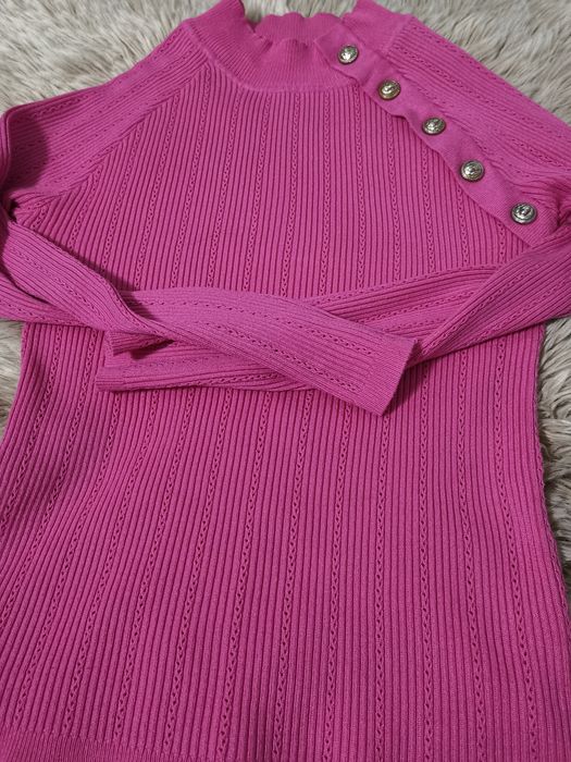 Różowy sweterek Uni