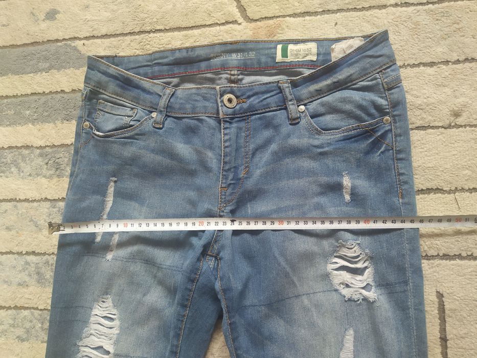 Spodnie skinny jeans z dziurami roz 31/L32