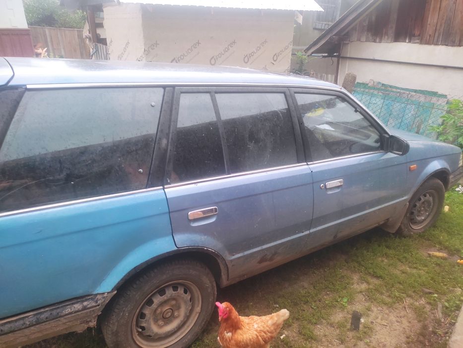 Мазда 323 на ходу