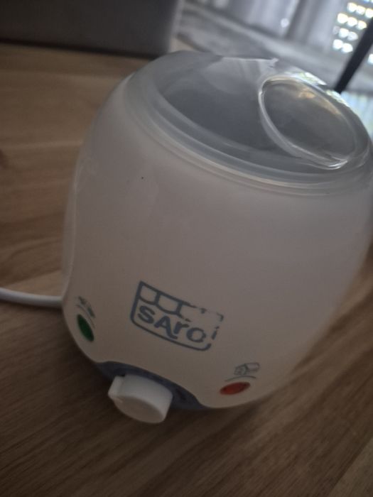 Aquecedor biberão da marca Saro de tomada