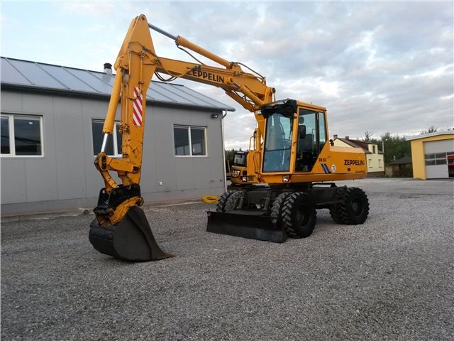 Услуги экскаваторов и самосвалов