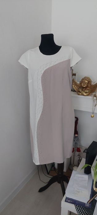 Polecam piękną sukienka na ważne uroczystosci