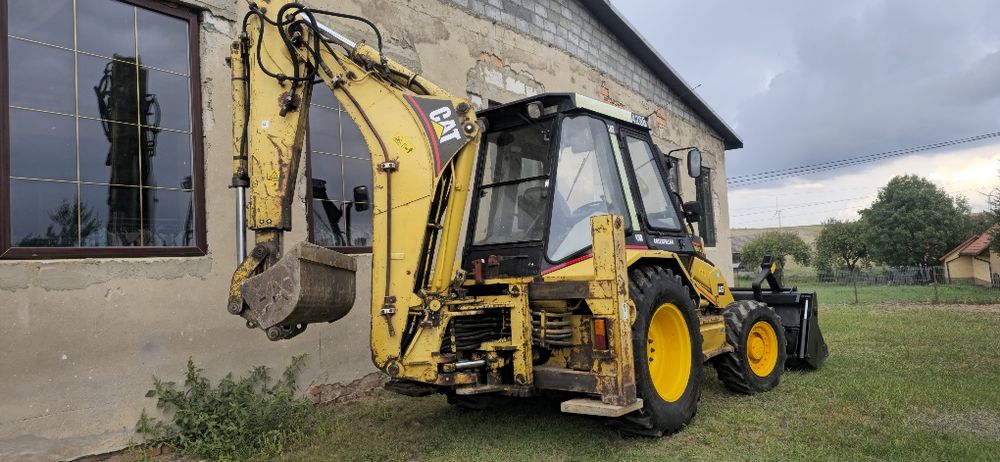 Sprzedam koparko ladowarka caterpillar cat 428b  4x4 pelna opcja