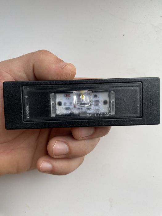 Ліхтар освітлення номерного знака  bmw оригінал Словакія