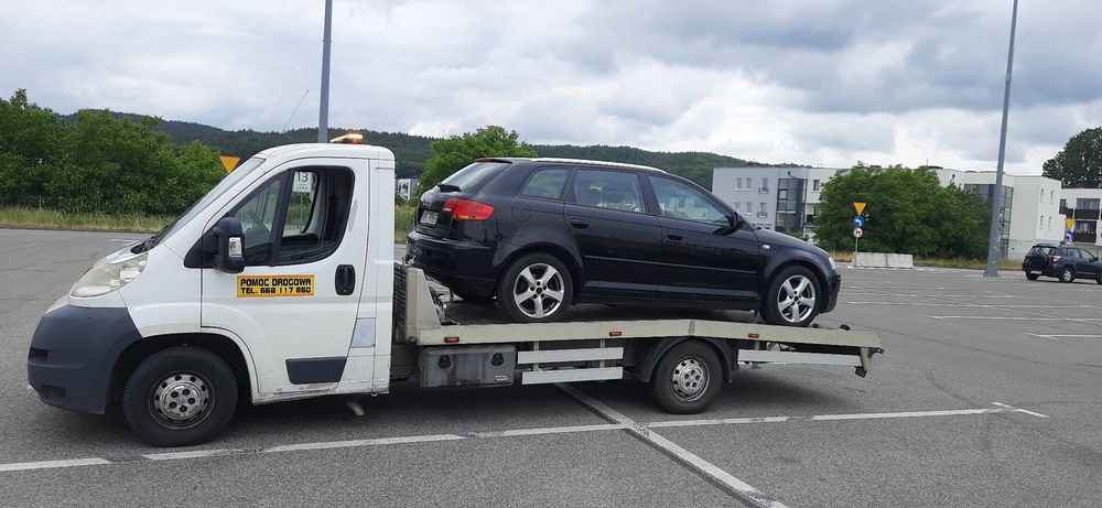 Pomoc drogowa,  holowanie,  transport wywrotka