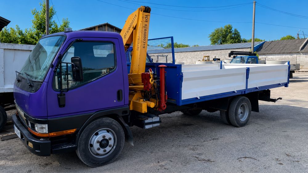 Виготовлення самоскидів ,  маніпуляторів та евакуаторів на базі Mitsubishi Canter Fuso