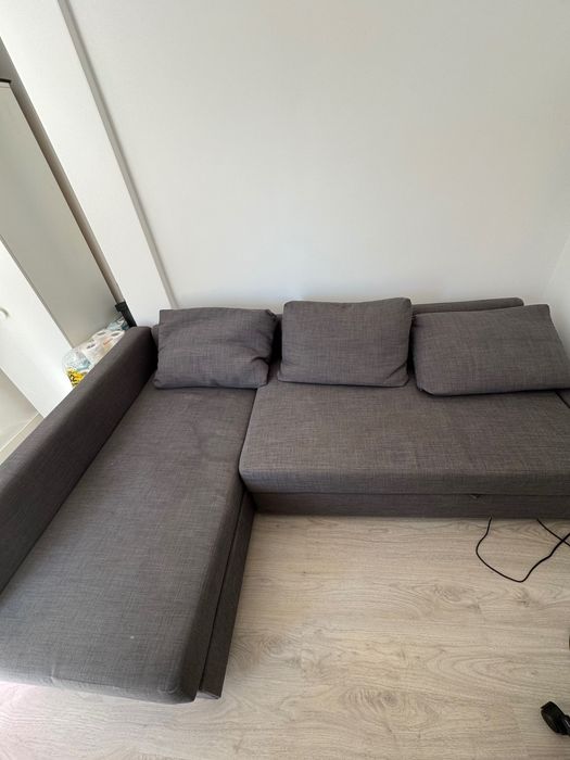 Sofa cama cinzento com arrumação