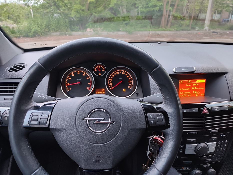 Opel Astra H універсал 1.8