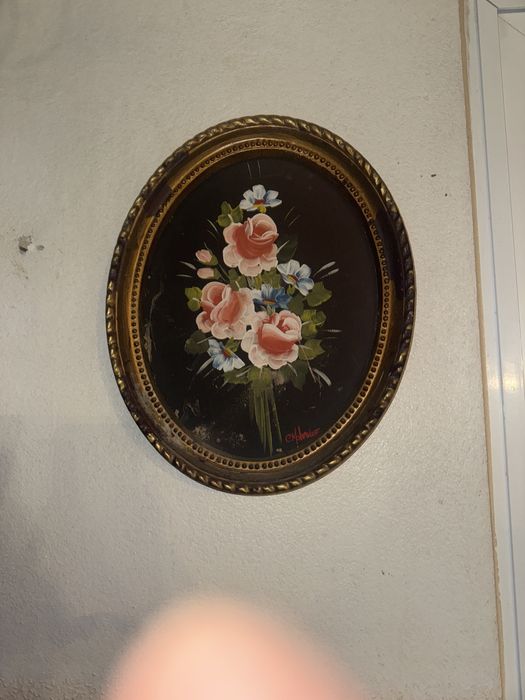 Quadro antigo com flor