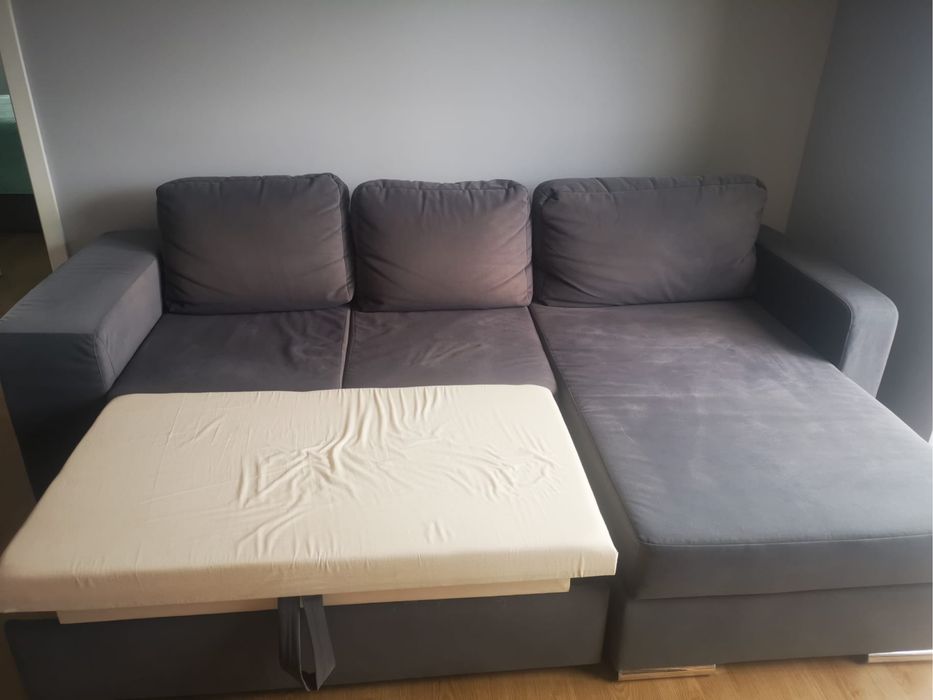 sofá cama cinzento