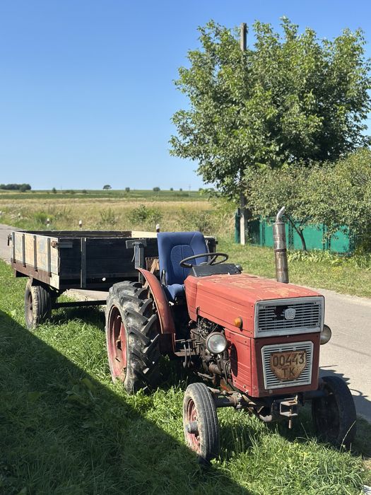 Трактор універсал 445 , причеп , косарка роторна z-069