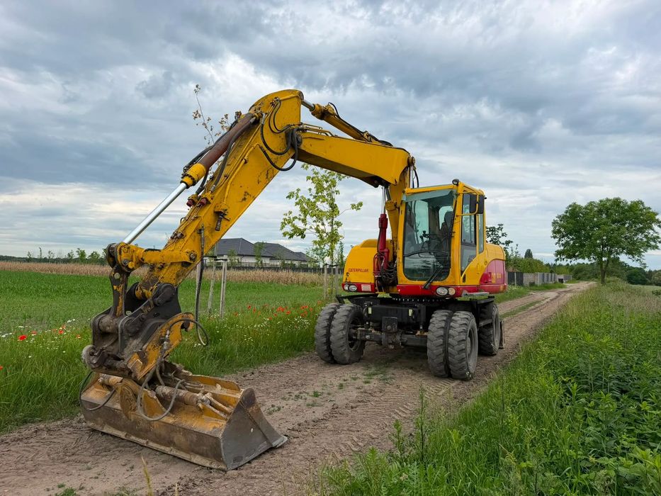 Caterpillar 313D  w ciągłej pracy
