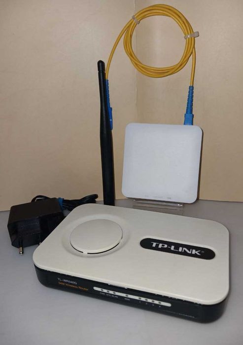 Абонентський термінал TelStream ONU-701 та TP-LINK TL-WR340G