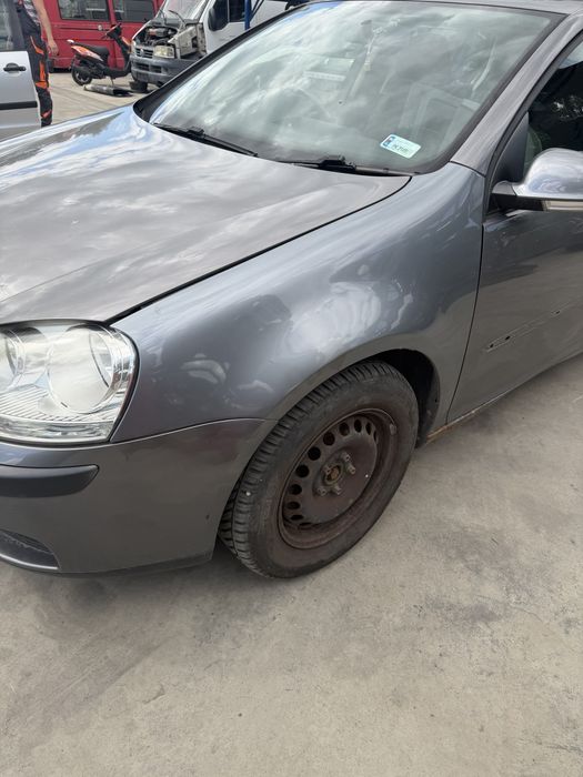 Błotnik Volkswagen Golf V LA7T lewy prawy przód