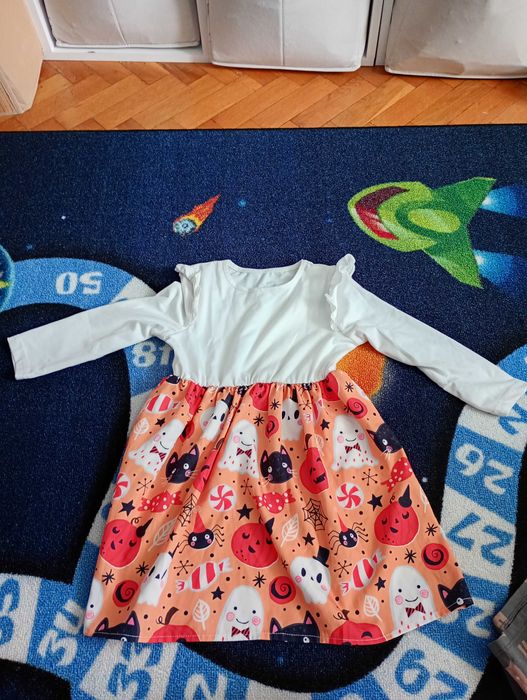 Sukienki dla dziewczynki 110-116