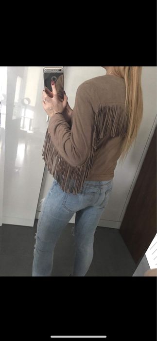 Spodnie jeansowe z dziurami suwak na nogawkach Vero Moda 32