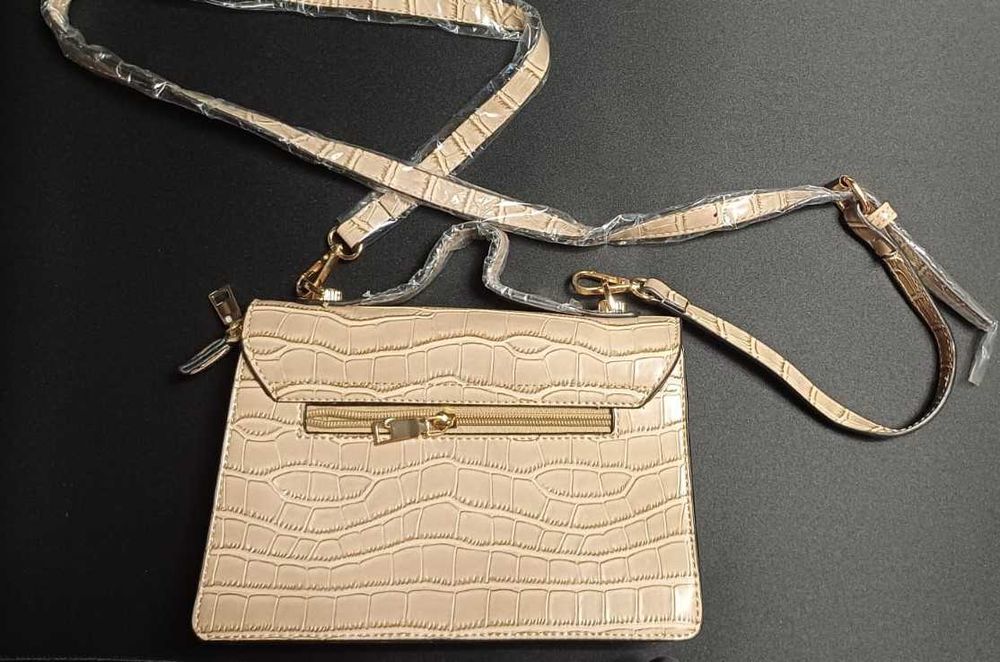 Mala tira colo bege [NUNCA USADA]